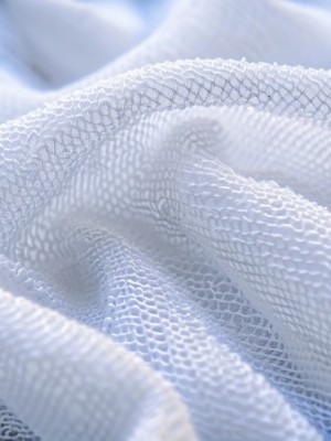 white-blanket-with-white-border-that-says-tp-it.jpg